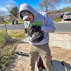 Spencer, who runs SB Mowing, was making a video when he stumbled on a cat with an injured leg.