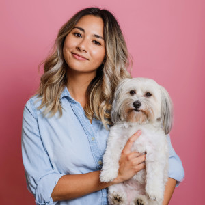 Mia Mercado with her small white dog 