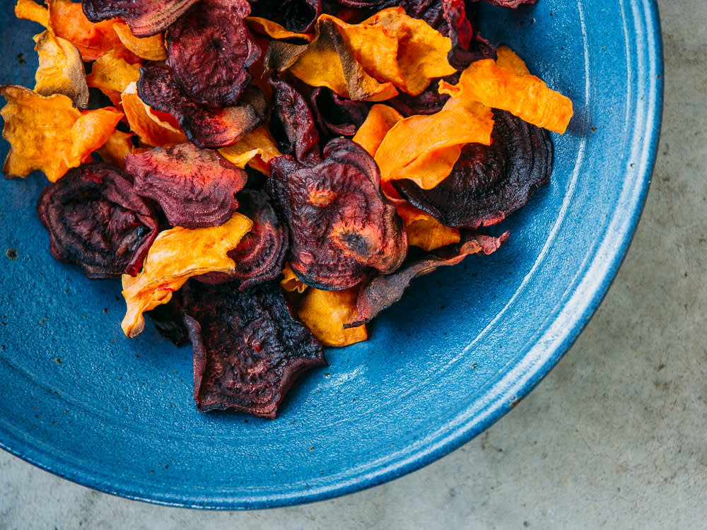 Various Veggie Chips in a Ceramic Blue Bowl