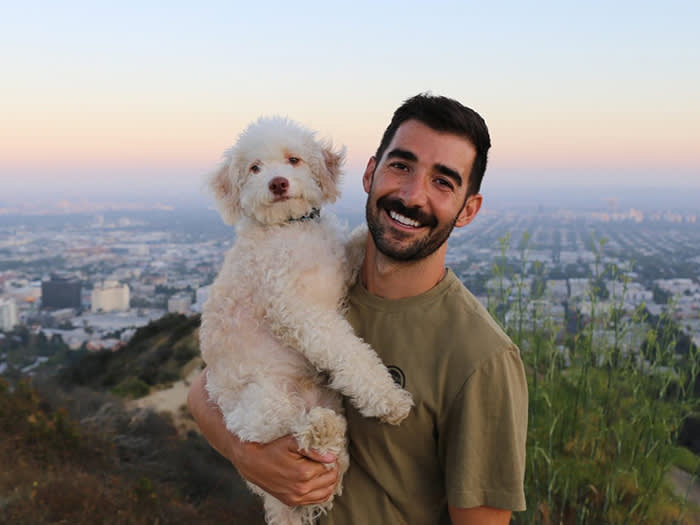 Dave Coast with his white dog